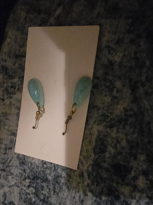 Conjunto de calça, brinco e blusa