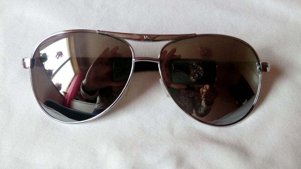 Oculos de sol novos