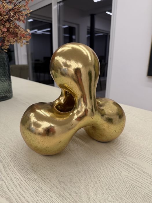 Peças decorativas douradas Kave home
