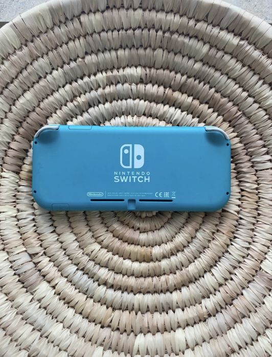 Nintendo switch lite azul/troca