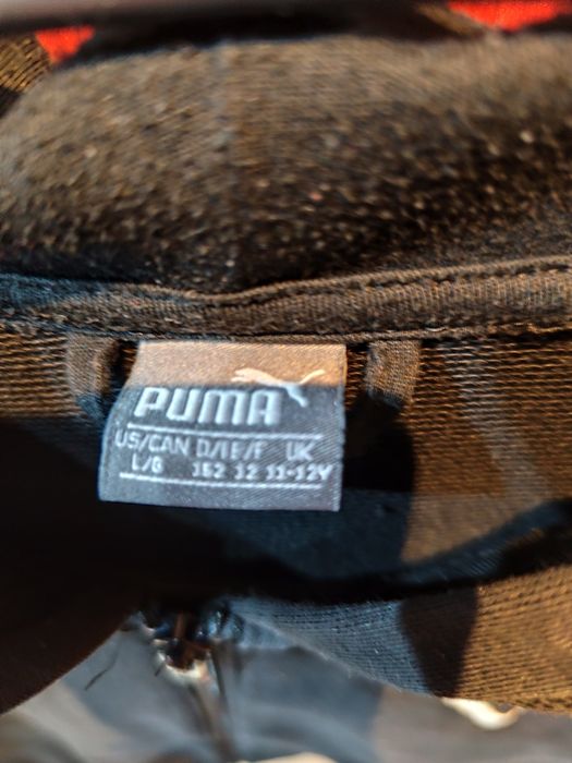 Bluza chłopięca Puma, czarna . Stan dobry. Rozmiar dziecięcy L