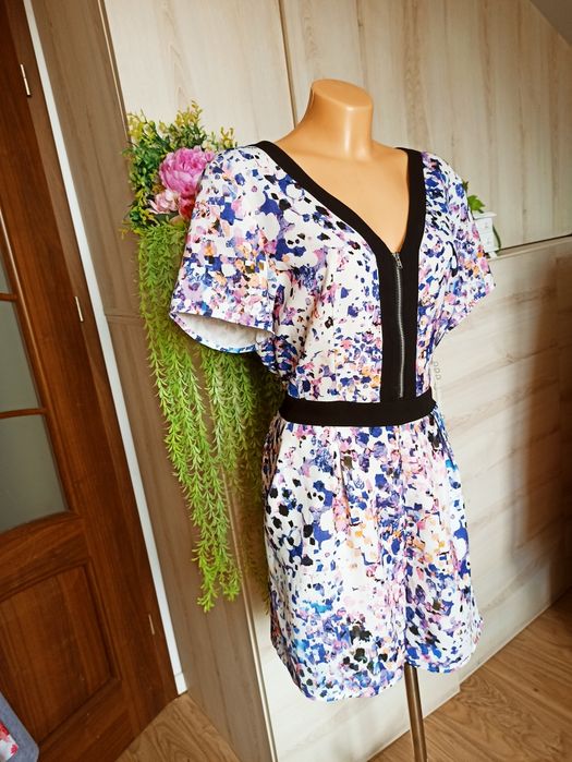 Sg Piękny letni krótki kombinezon damski 42 , XL