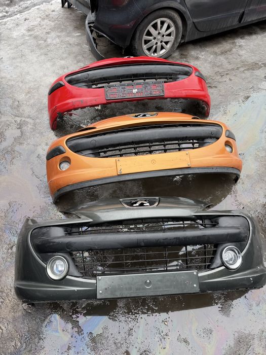 Бампер передній Peugeot 207