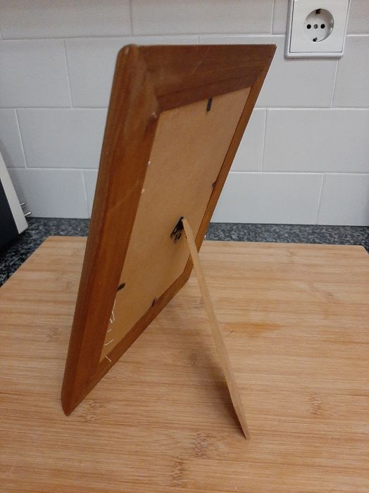 Moldura em madeira com peluche