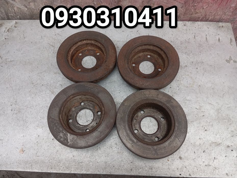 Тормозні диски вентильовані та прості Ford Escort Форд Ескорт Оріон.