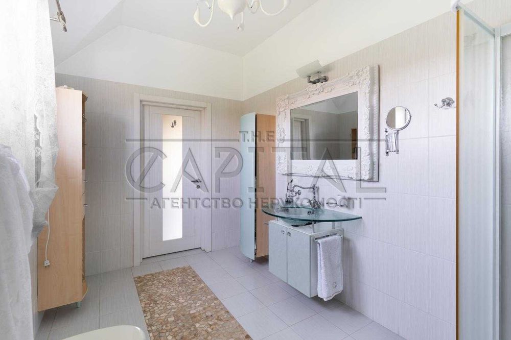 Продаж сучасного будинку 280 м² з підвалом 80 м² на ділянці 12 соток у Вишеньках