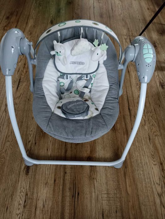 Wielofunkcyjna huśtawka bujak elektryczny dla niemowlaka Ricokids