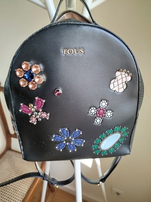 Mochila preta da tous  tenho certificado de autenticidade