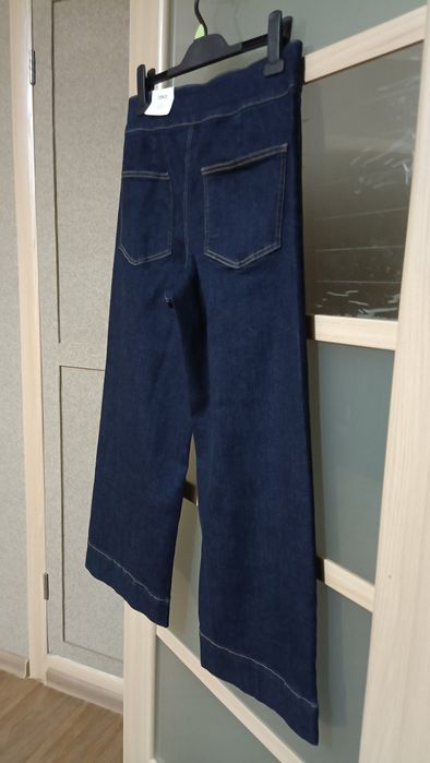 Джинси укорочені 48 розмір