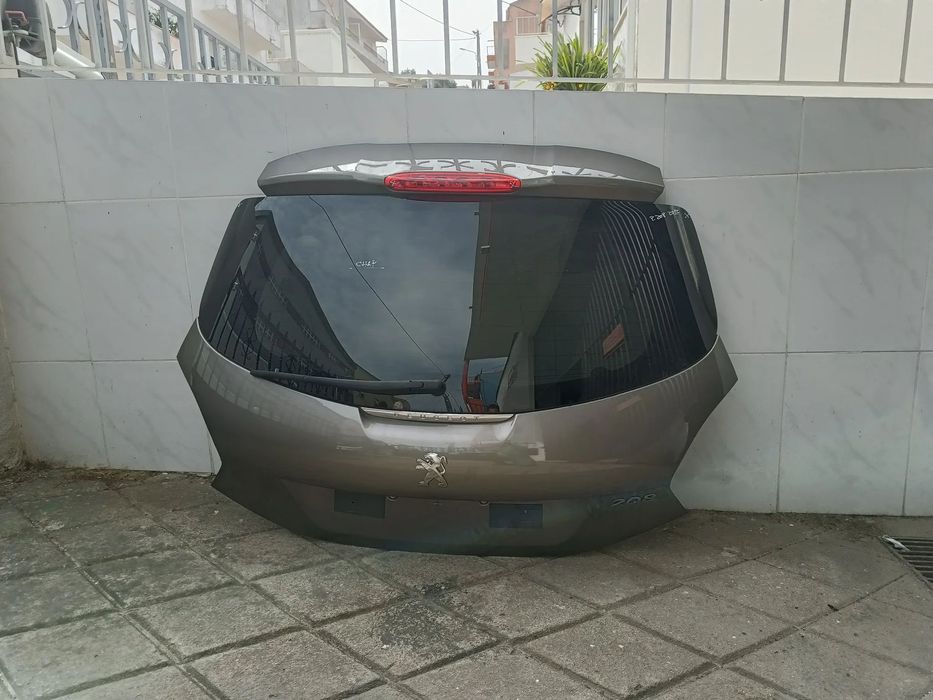 tampa mala Peugeot 208 2013