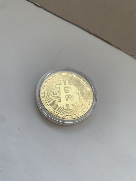Монета Bitcoin..