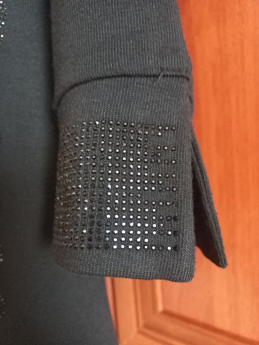 Нарядна трикотажна кофтина.