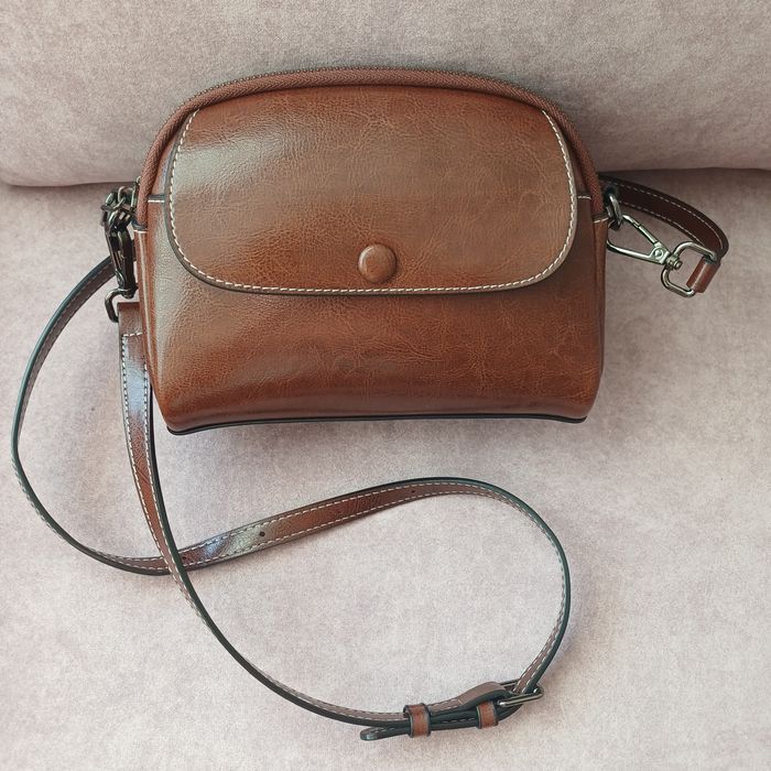 Listonoszka że skóry