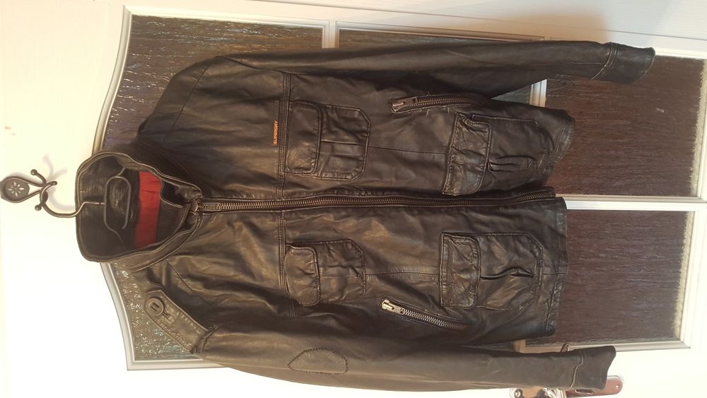 Redukcja ceny . Skora meska Superdry
