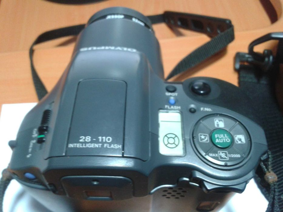 Máquina fotográfica Olympus (rolo)