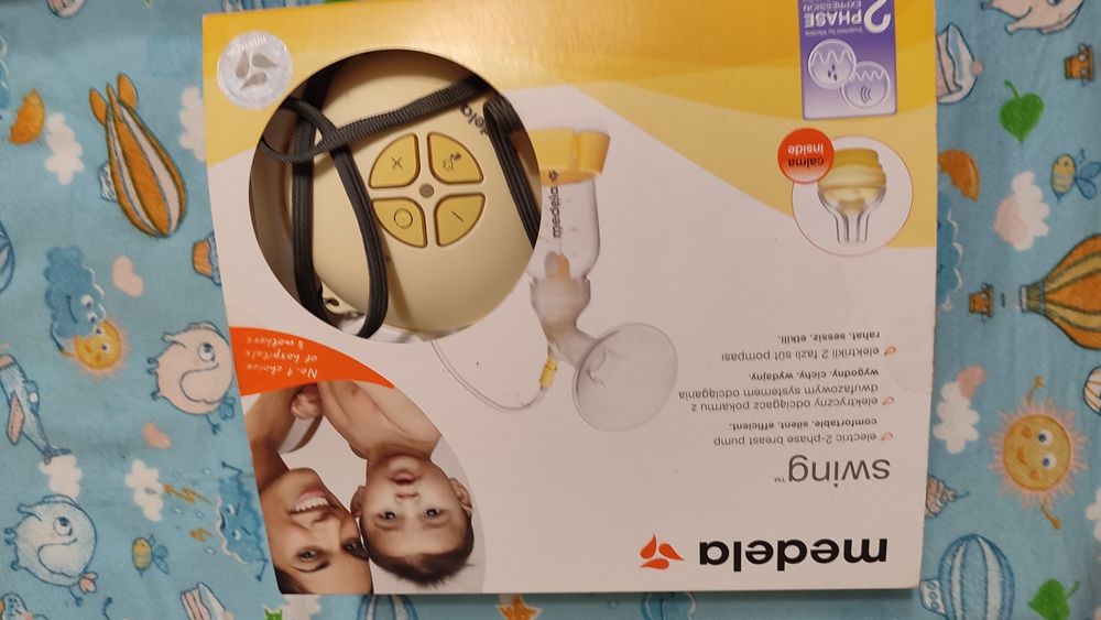 Молокоотсос молоковідсмоктувач електричний Medela swing+ система Кальм