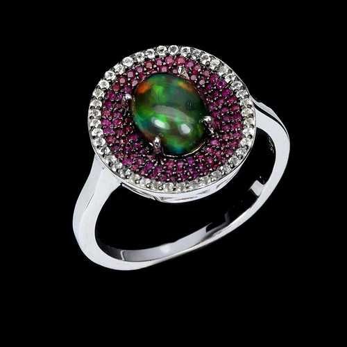 Кольцо S 925 пробы с черным опалом 9x7 мм, рубином топазом. Р18.75