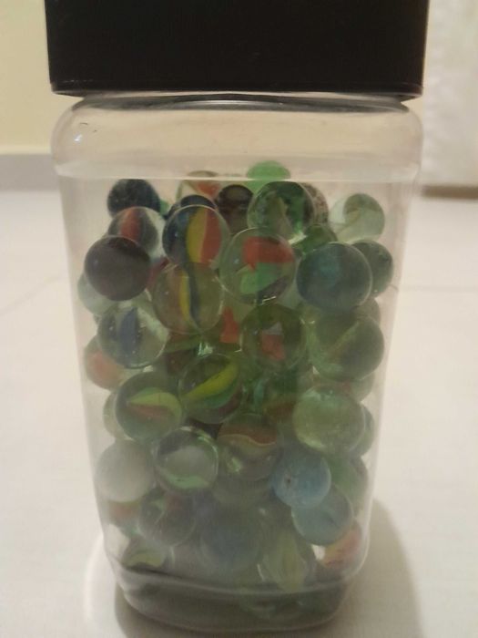 Frasco com berlindes