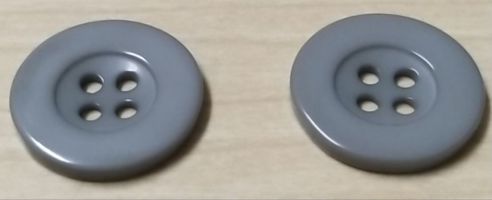 18 Botões de 21 mm.