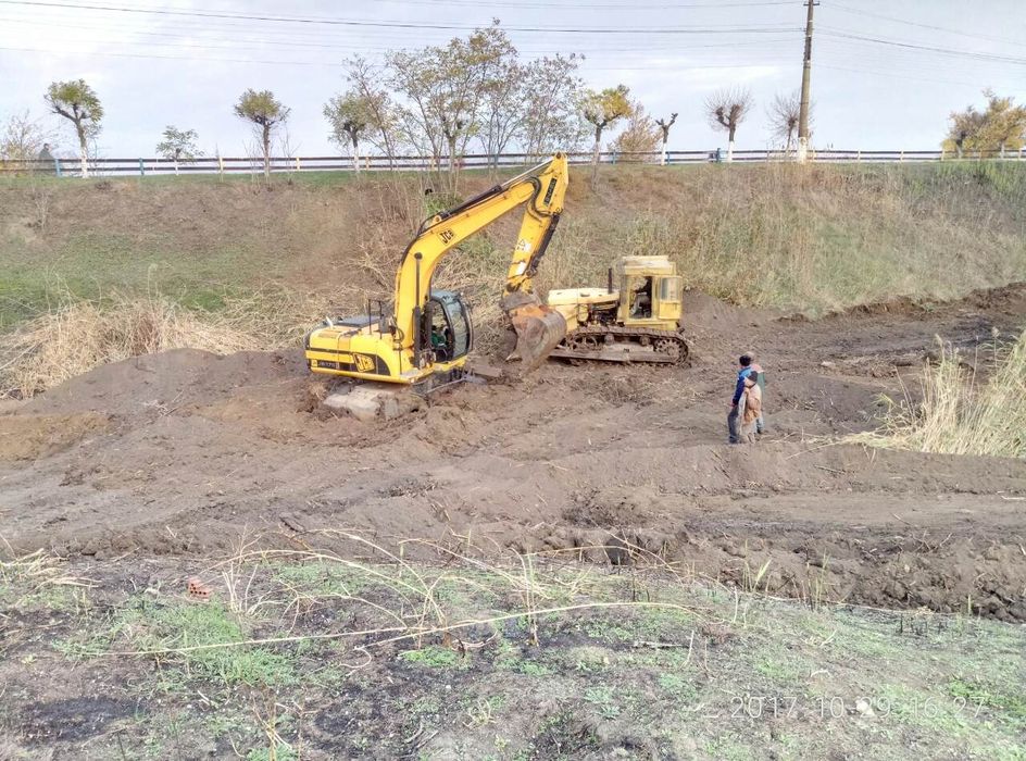 Работа эксковатора,грейдера,самосвалы