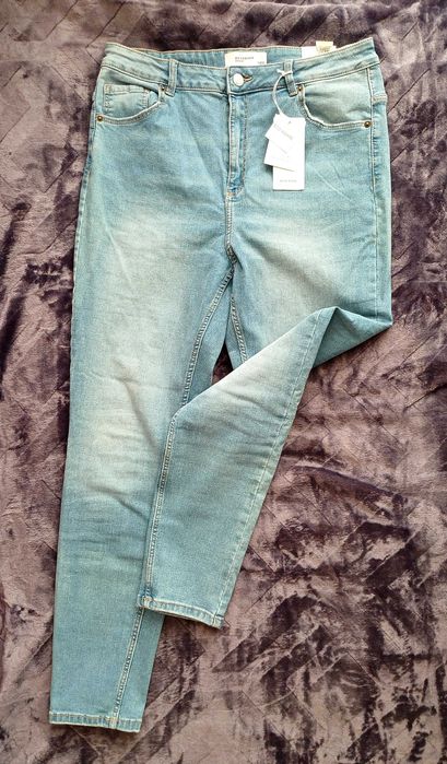 nowe jeansy Reserved jasny niebieski 44 slim high rise