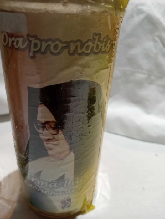 Velões com oração velas