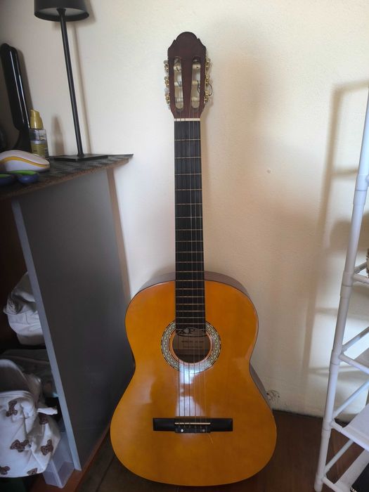 Guitarra como nova
