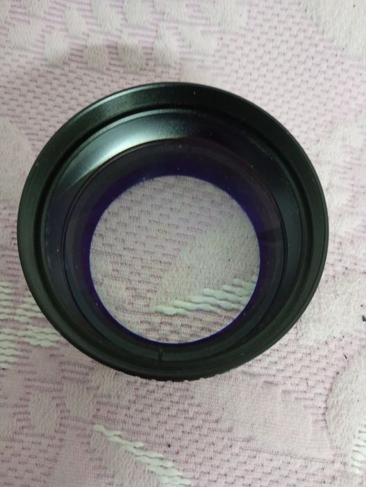 Teleconversor usado em câmera de Video