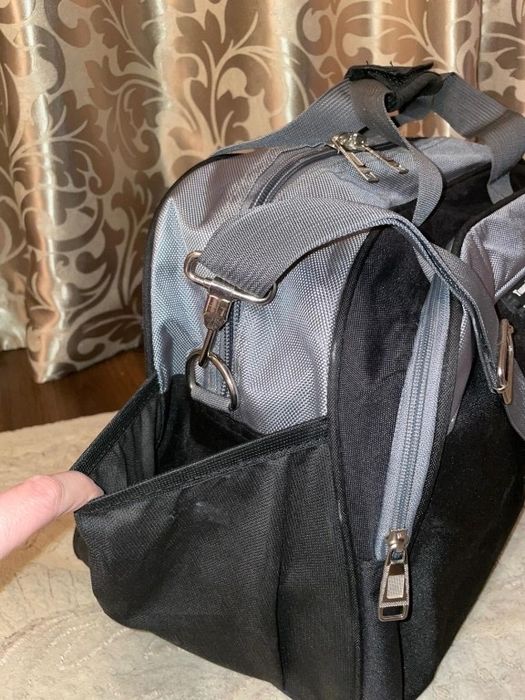 Дорожня вмістка сумка