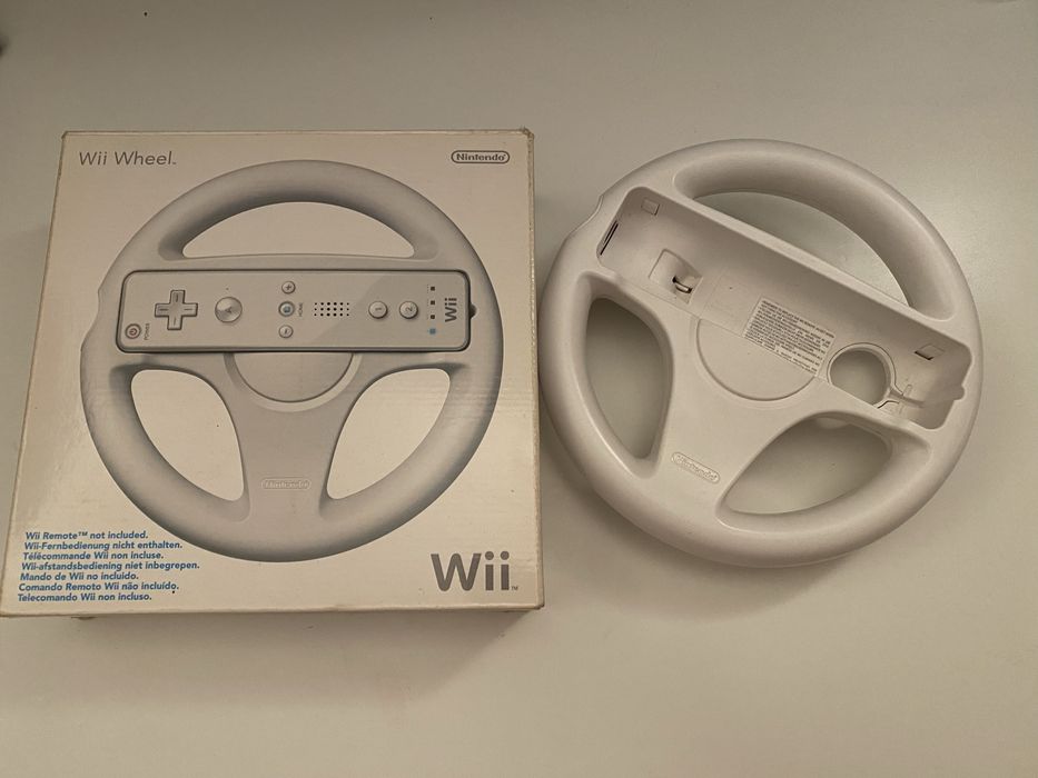 Nintendo Wii + comandos + jogos + cabos necessários