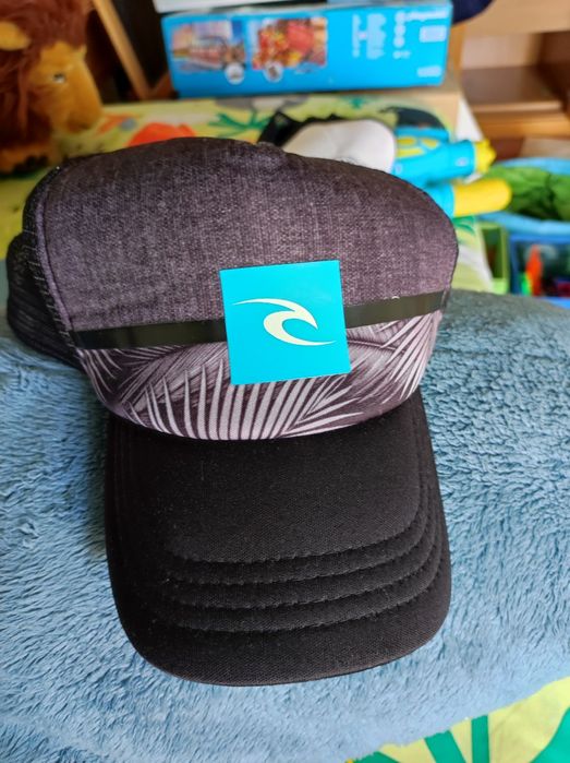 Bonés criança rip curl e new era