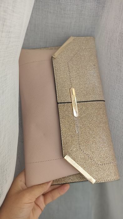 Клатч кольору пудра .