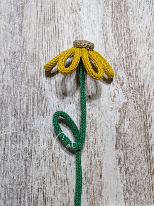 Flores em tricotin