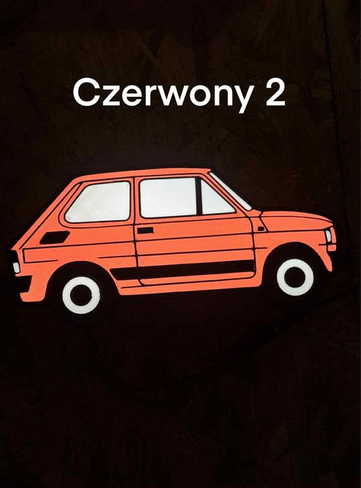 Dwie lampki zolta i czerwona maluch z widocznymi wadami wizualnymi