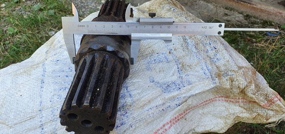 Вал - шестерня с редуктора механизма поворота автокрана КС3562Б