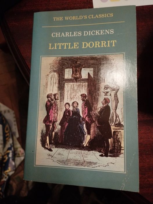 3 livros escritos em Inglês "Nicholas Nigkleby", "Little Dorrit" e "Pr