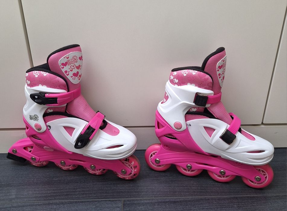 Patins em linha rosa