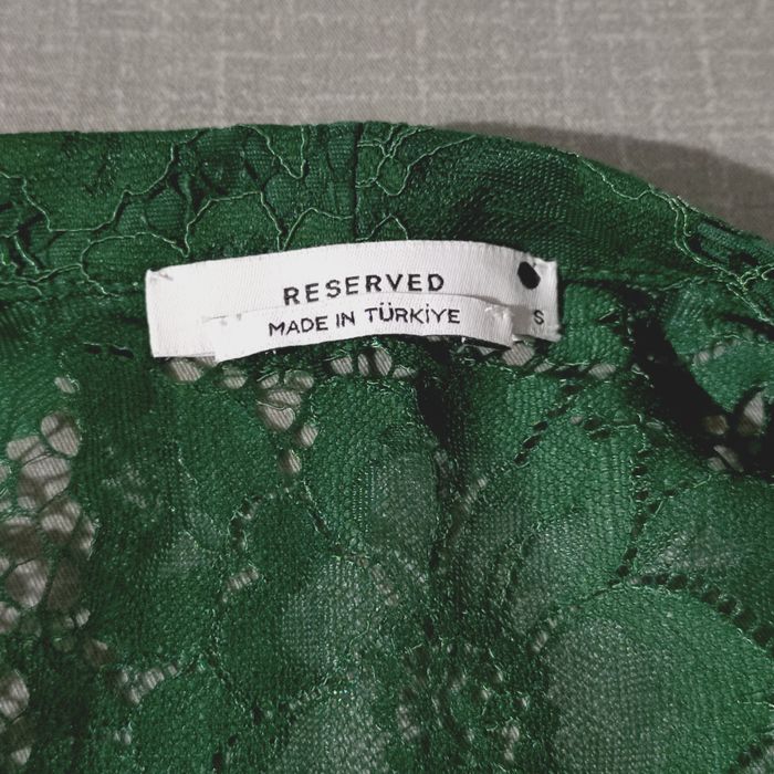 Zielona sukienka firmy Reserved