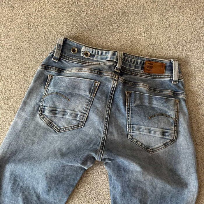 джинси кльош на низькій посадці