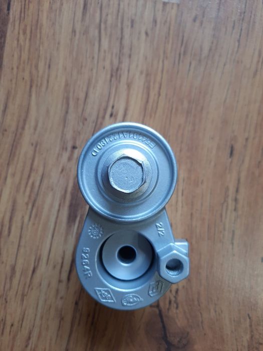 Натягувач ремня Renault