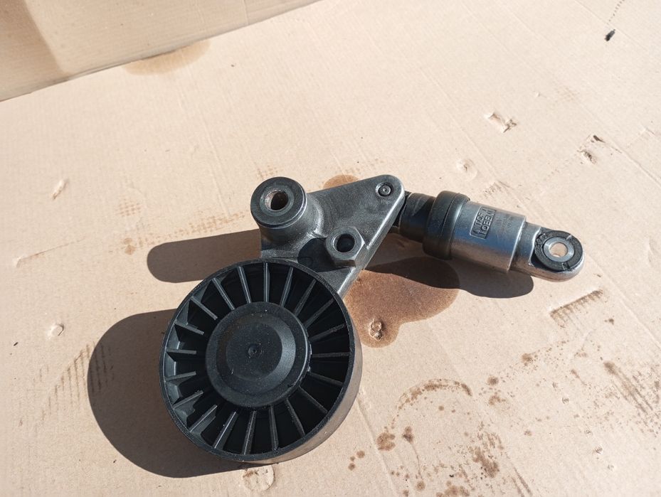 Натяжний ролик механізм 2.0 2.2 Opel Vectra Zafira Astra Omega Fronter