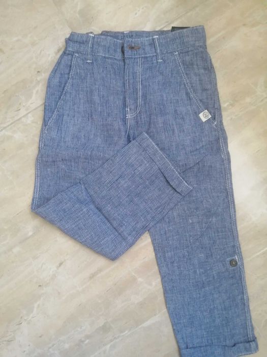 Materiałowe spodnie H&m 116