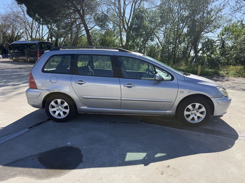 Peuogot 307 ano 2004  gasolina e gas