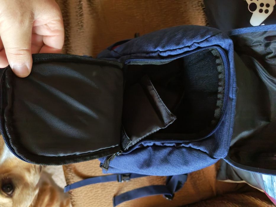 Mochila, máquina fotográfica