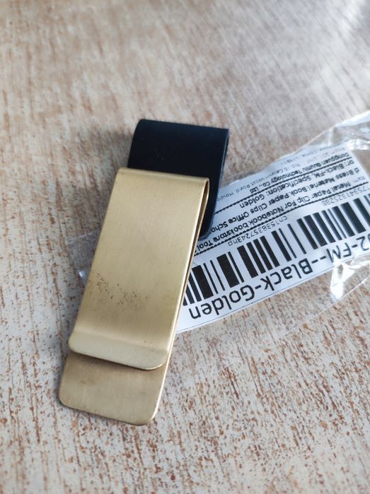 Кліпса до блокнота для тримання ручки