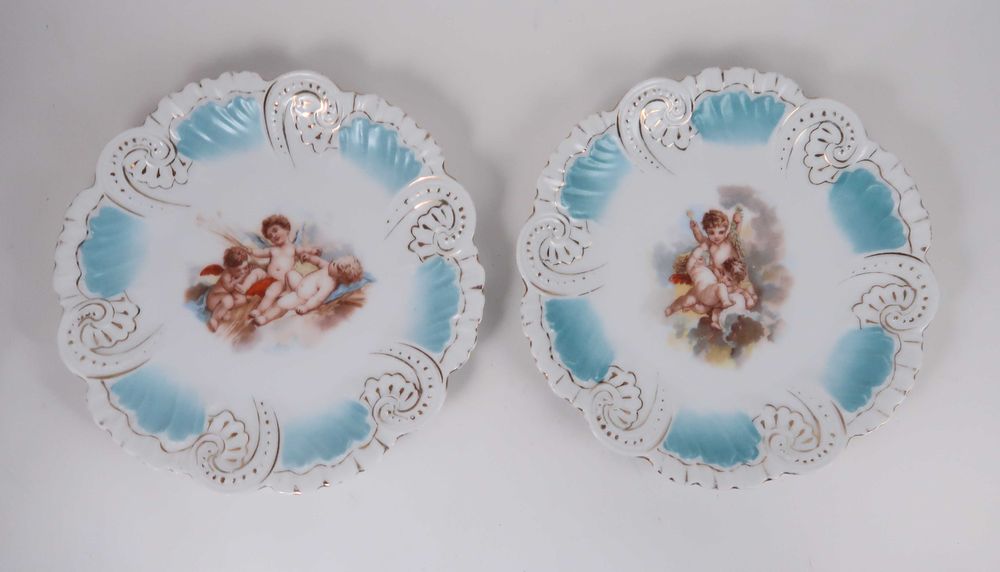 Par de pratos porcelana moldada XIX/XX - Anjos