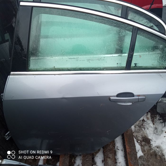 Opel Insignia A drzwi lewy tył Z163 klamka zamek silniczek szyby