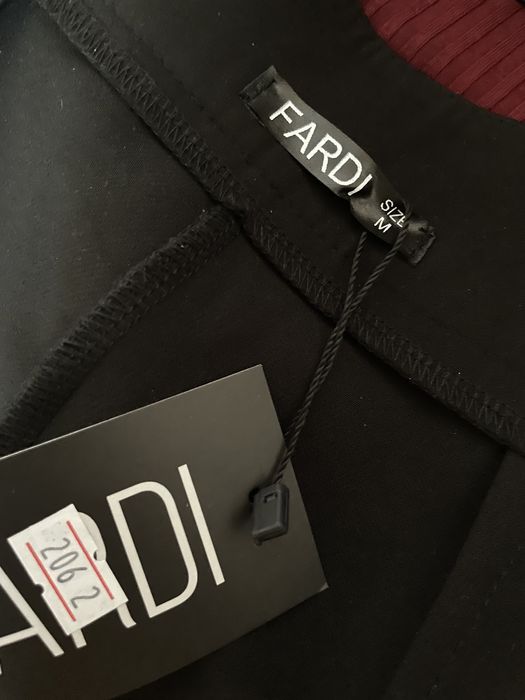 Брюки клеш с разрезом НОВЫЕ