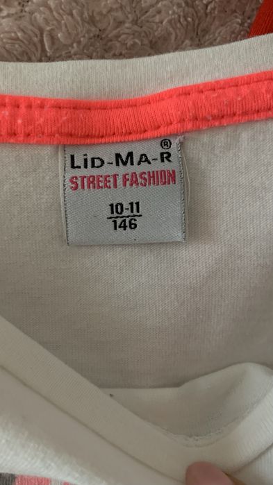 Biała bluzeczka dla dziewczynki 146