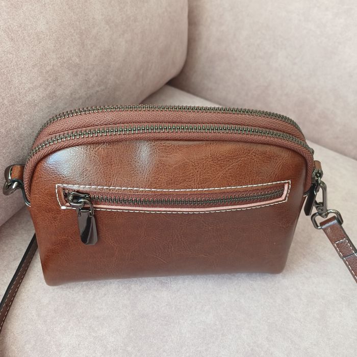 Listonoszka że skóry